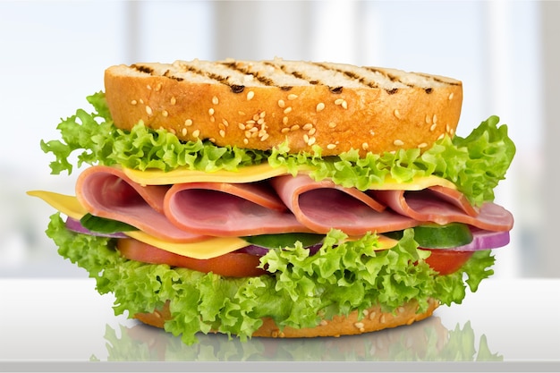 Fresh tasty sandwich on  background