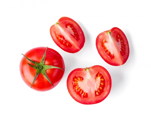 Fresh tomatoes on white wall. 