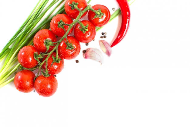 Fresh tomatoes with pepper and garlic isolated