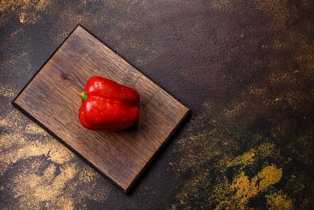 Fresh torn red sweet pepper from the autumn harvest