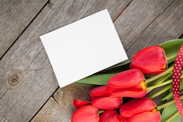 Fresh tulips and greeting card