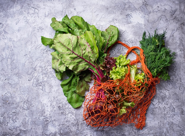 Fresh vegetable in fishnet bag