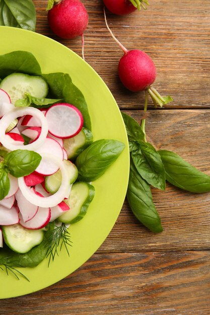 Fresh vegetable salad on table close up