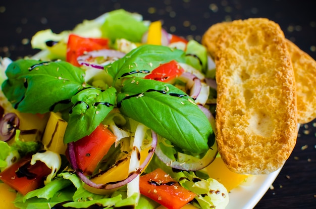 Fresh vegetable salad with bread