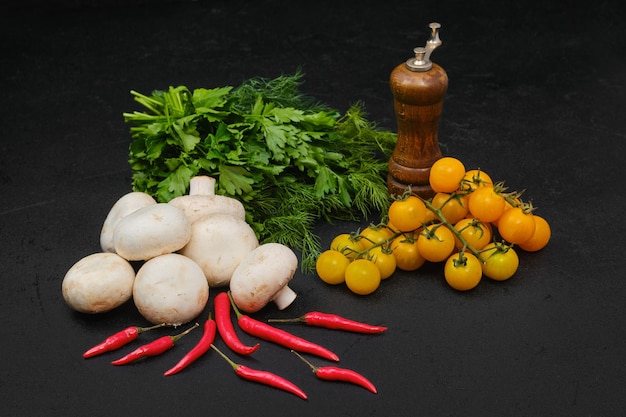 Fresh vegetables on black background