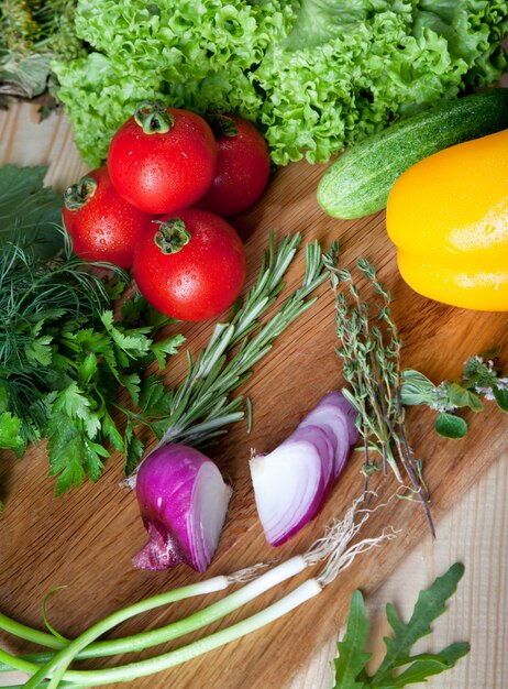 Fresh vegetables on cutting board.