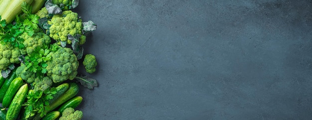 Fresh vegetables on a dark background Assortment of vegetables Healthy vegetarian food