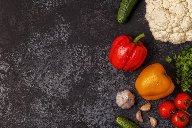 Fresh vegetables on a dark table