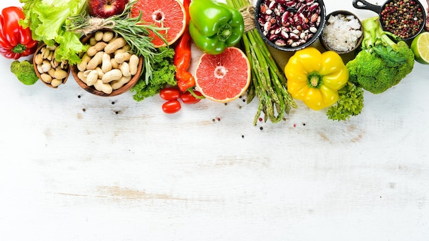 Fresh vegetables and fruits on a white background Top view Free copy space