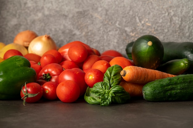 Fresh vegetables on a gray table