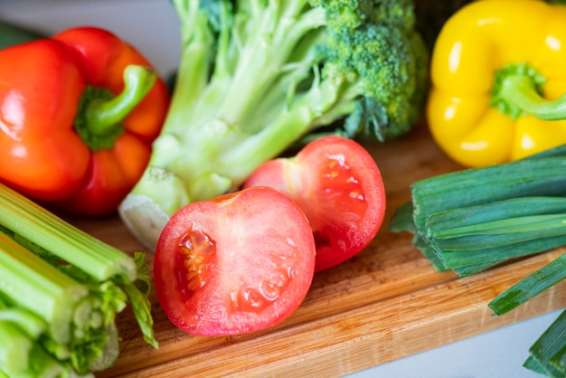 fresh vegetables for iceberg salad with paprika with cabbage broccoli tomatoes and celery