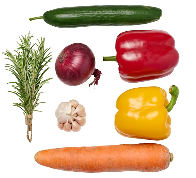 Fresh vegetables onion carrot yellow and red bell peppers a bunch of rosemary on a white isolated background