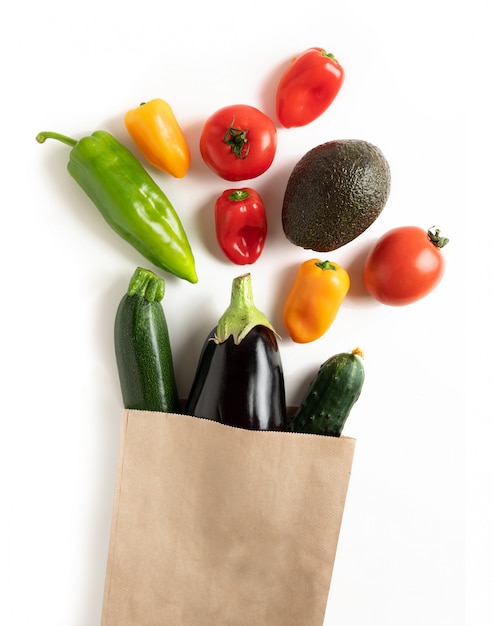 Fresh vegetables in recyclable paper bag isolated