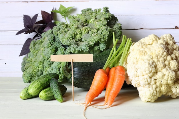 Fresh vegetables rustic wooden background