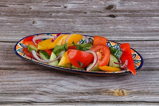 Fresh vegetables salad tomato cucumber pepper