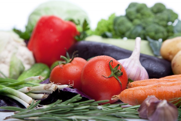 Fresh vegetables on white.