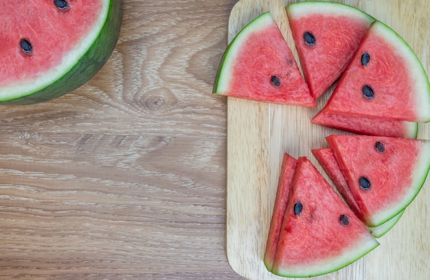 fresh watermelon on wooden background. sweet summer fruit.