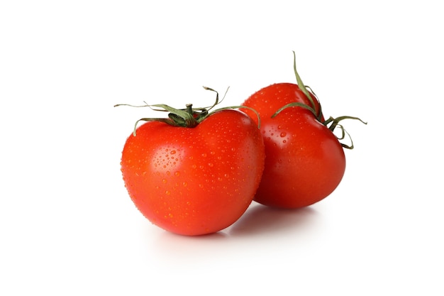 Fresh wet tomatoes isolated on white background