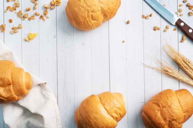 Fresh wheat bread rolls. Rolls for a hot dog or hamburger. White background copy space.