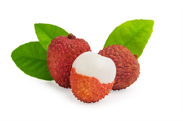 Fresh whole and riped lychees with leaves isolated 