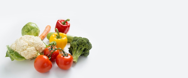 Fresh whole vegetables on a white table Cooking diet Banner