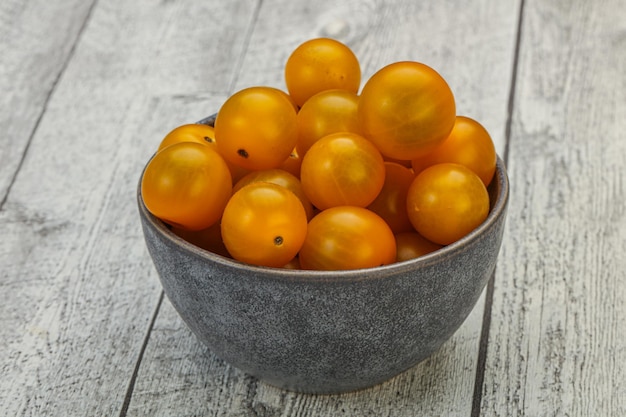 Fresh yellow tasty cherry tomato heap