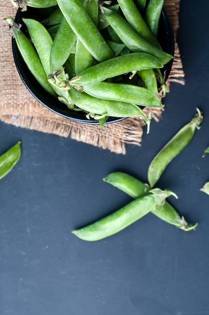 Fresh, young, unpeeled green peas