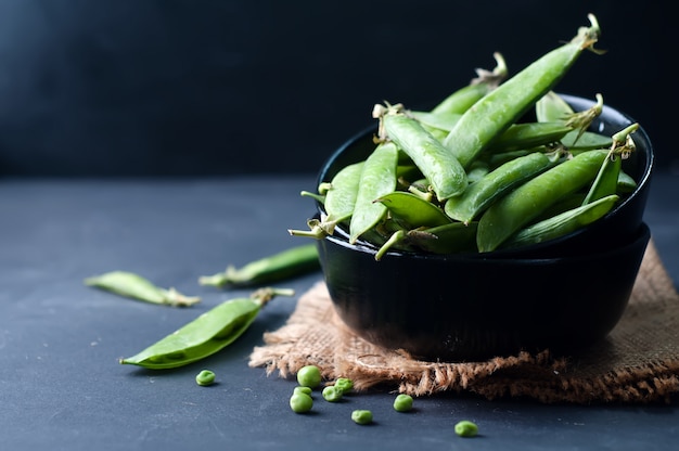 Fresh, young, unpeeled green peas