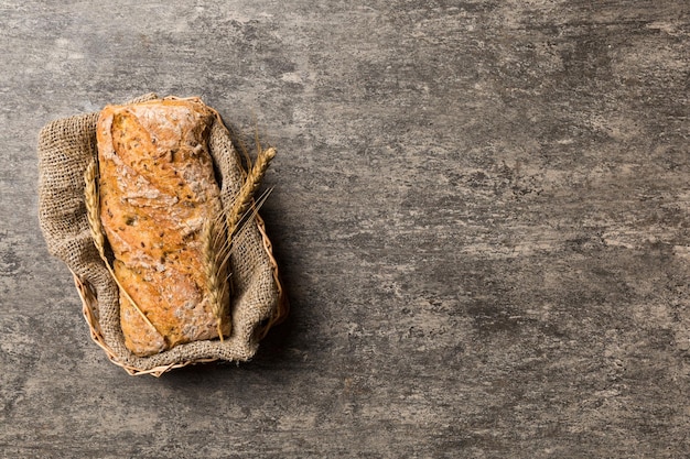 Freshly baked bread on basket against natural background top view bread copy space