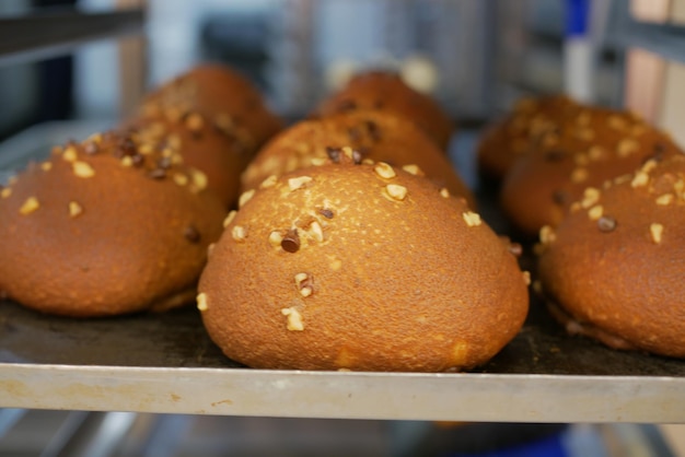 Freshly baked bread lies on the shelves ready for sale