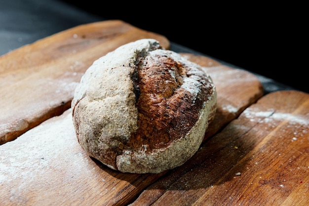 Freshly baked bread with a golden crust close up