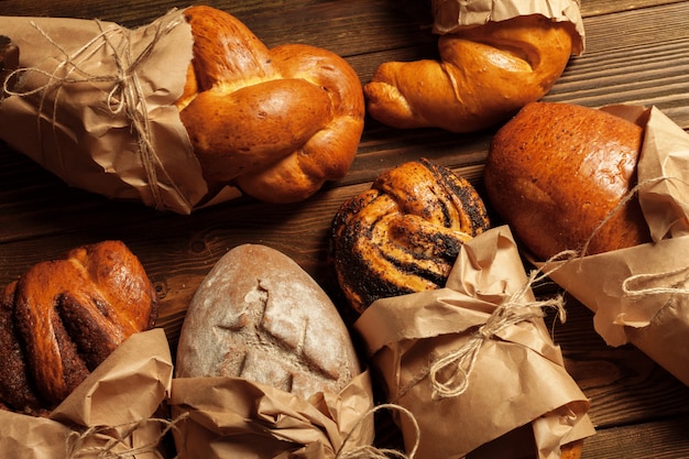 Freshly baked bread on wooden table