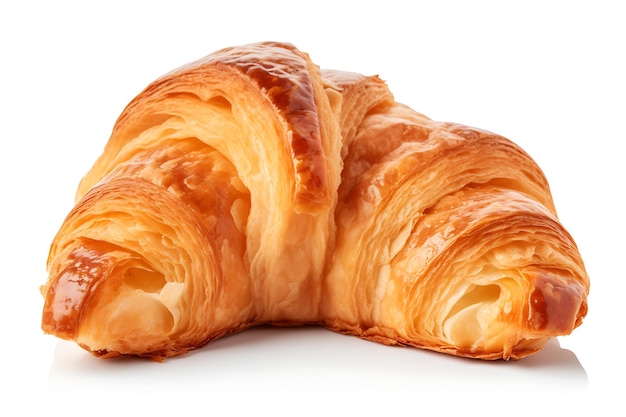 Freshly baked croissant cut in half isolated on white