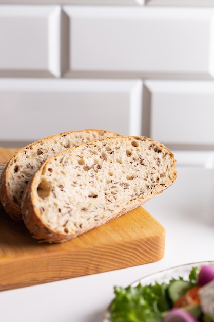 Freshly baked cutted bread on a board