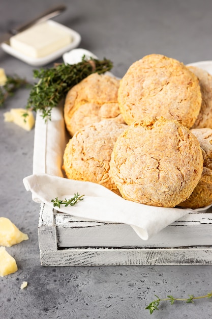 Freshly baked delicious homemade English scones with cheese and thyme