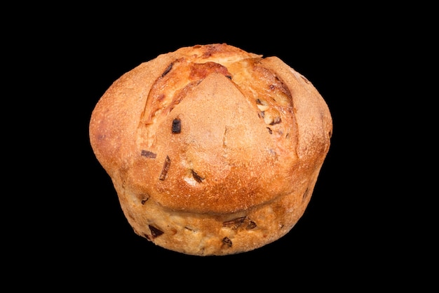 Freshly baked homemade bread isolated on black. Cheese and onion bread. Healthy eating and traditional bakery, baking bread concept.