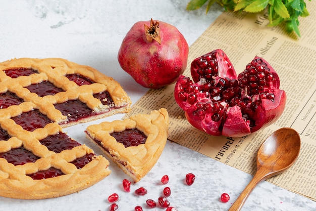 freshly baked homemade pomegranate cake with pomegranate fruit