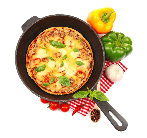 Freshly baked pizza in a pan on white background