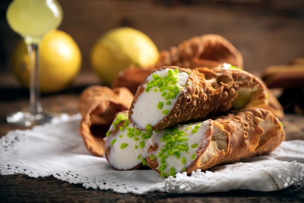 Freshly baked sicilian Cannoli dusted with powdered sugar