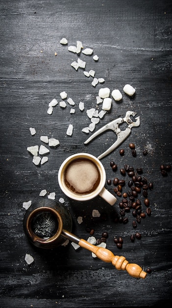 Freshly brewed coffee with crystalline sugar.