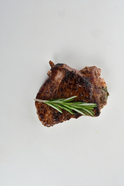 freshly grilled steak isolated on white background