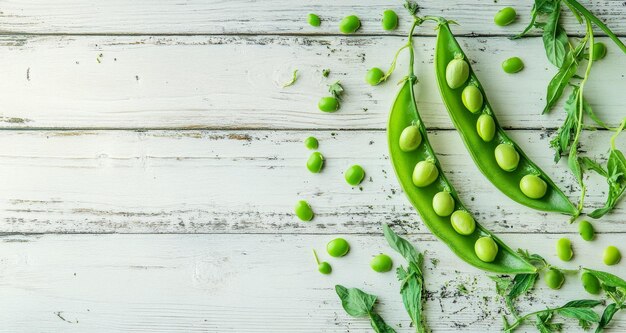 Photo freshly harvested green peas spread out on a rustic wooden table with leaves and pods