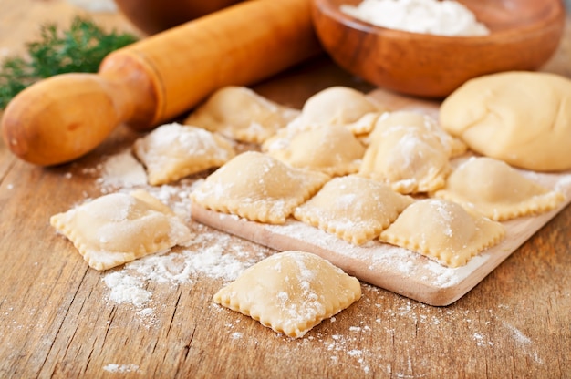 Freshly made homemade delicious homemade ravioli with a roller