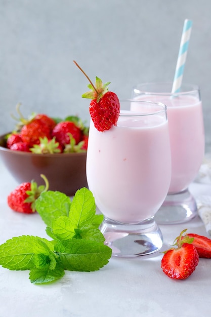 Freshly squeezed strawberry berry cocktail and health or detox diet nutrition concept