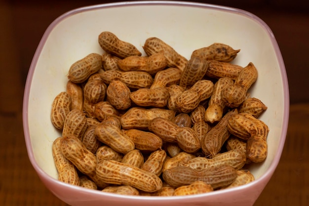 Freshly teamed organic peanuts in a bowl