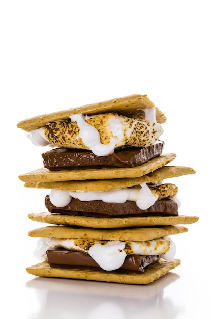 Freshly toasted smores with large white marshmallows.