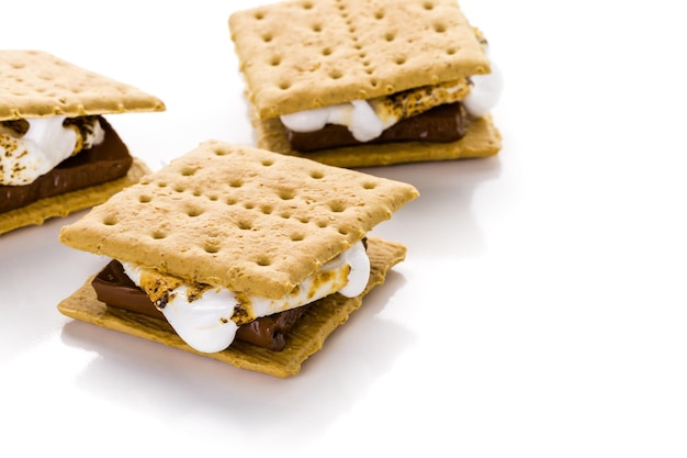 Freshly toasted smores with large white marshmallows.