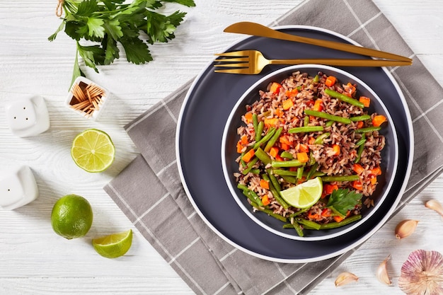 Fried brown rice with green beans and carrot