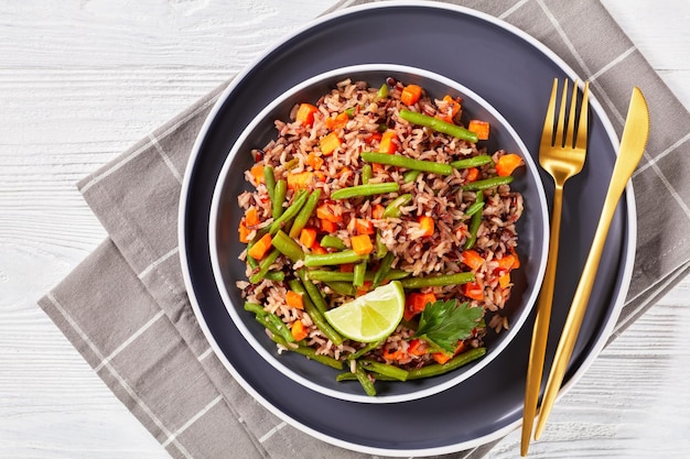 Fried brown rice with green beans and carrot