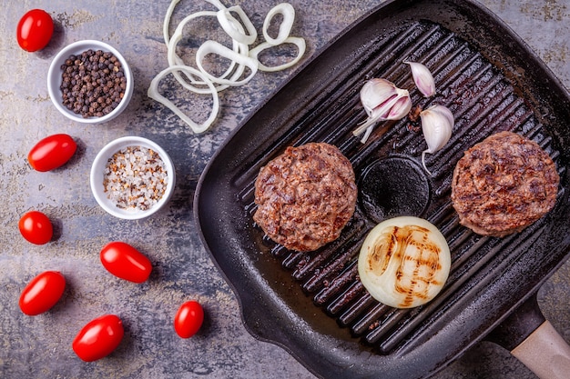 Fried burger beef cutlets with vegetables